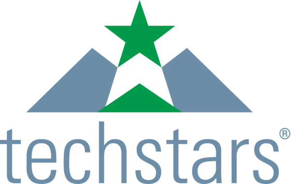 Techstars logo featuring two blue mountain peaks with a green star above and the word 'techstars' below in blue lowercase letters.